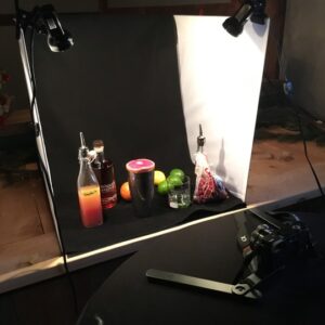 behind the scene shot of photographing cocktails and spirits