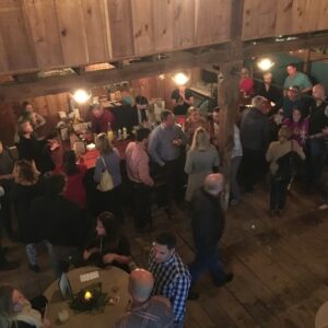 aerial shot from the top floor of the barn, an image of the people conversing during a wiggly bridge event