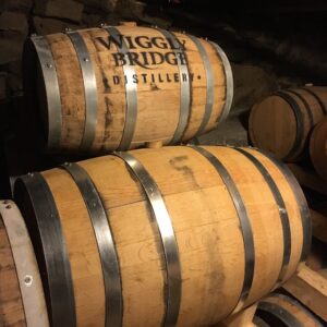 image of two barrels sitting in a wiggly bridge barn