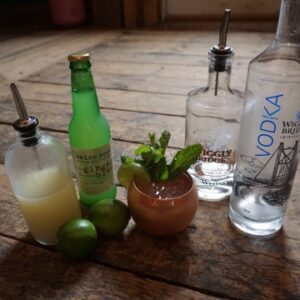 ingredients pictured on a table to make a wiggly harbor mule